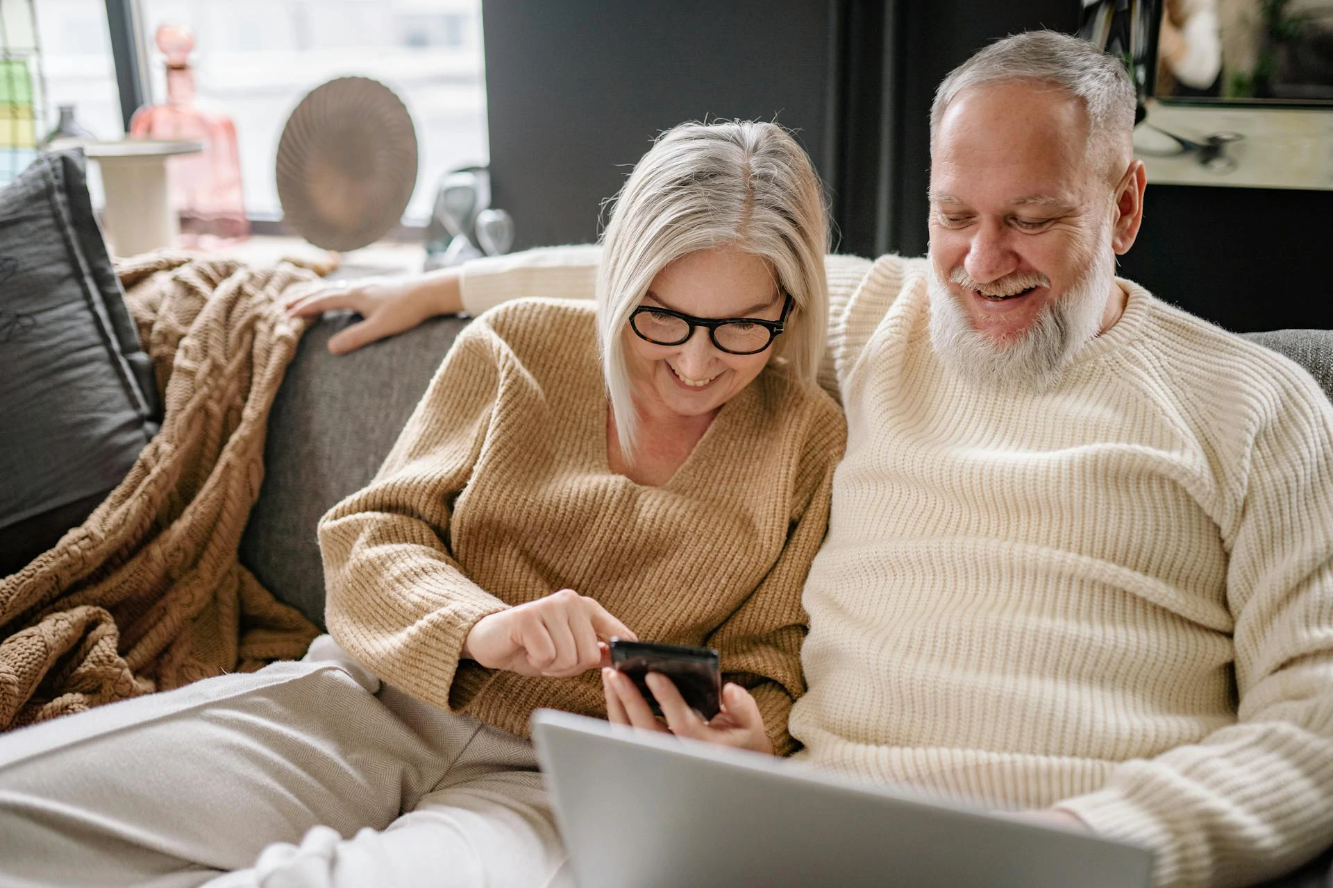 Retirement couple in sofa